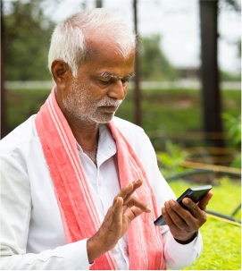 Indian farmers working in fields representing agricultural community partnerships